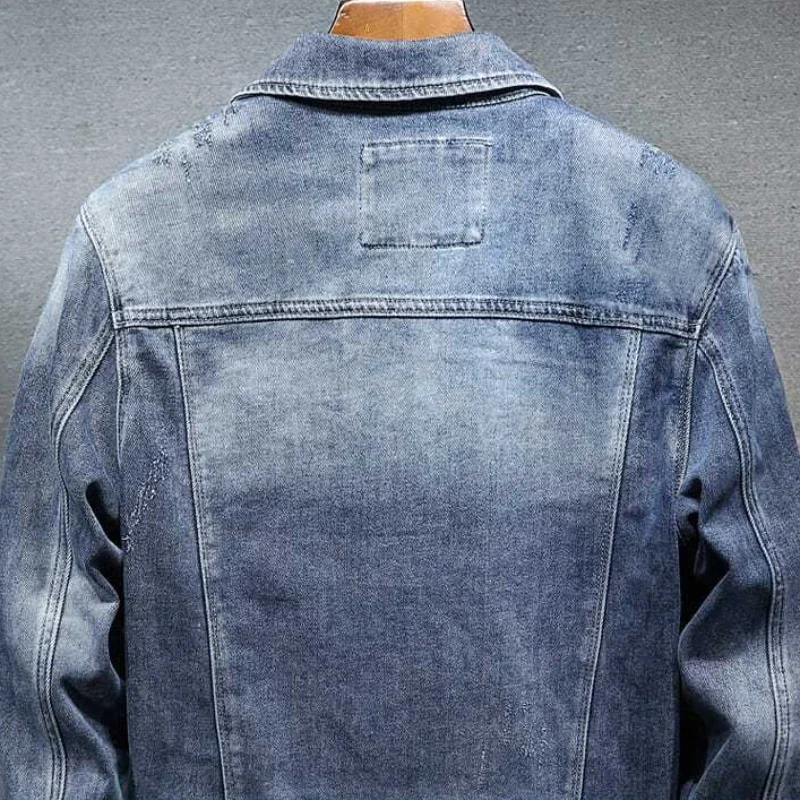 Cappotti di jeans maschili giacca di jeans da uomo strappata blu spalle larghe con foro abbigliamento da uomo prezzo economico moda elegante di tessuto