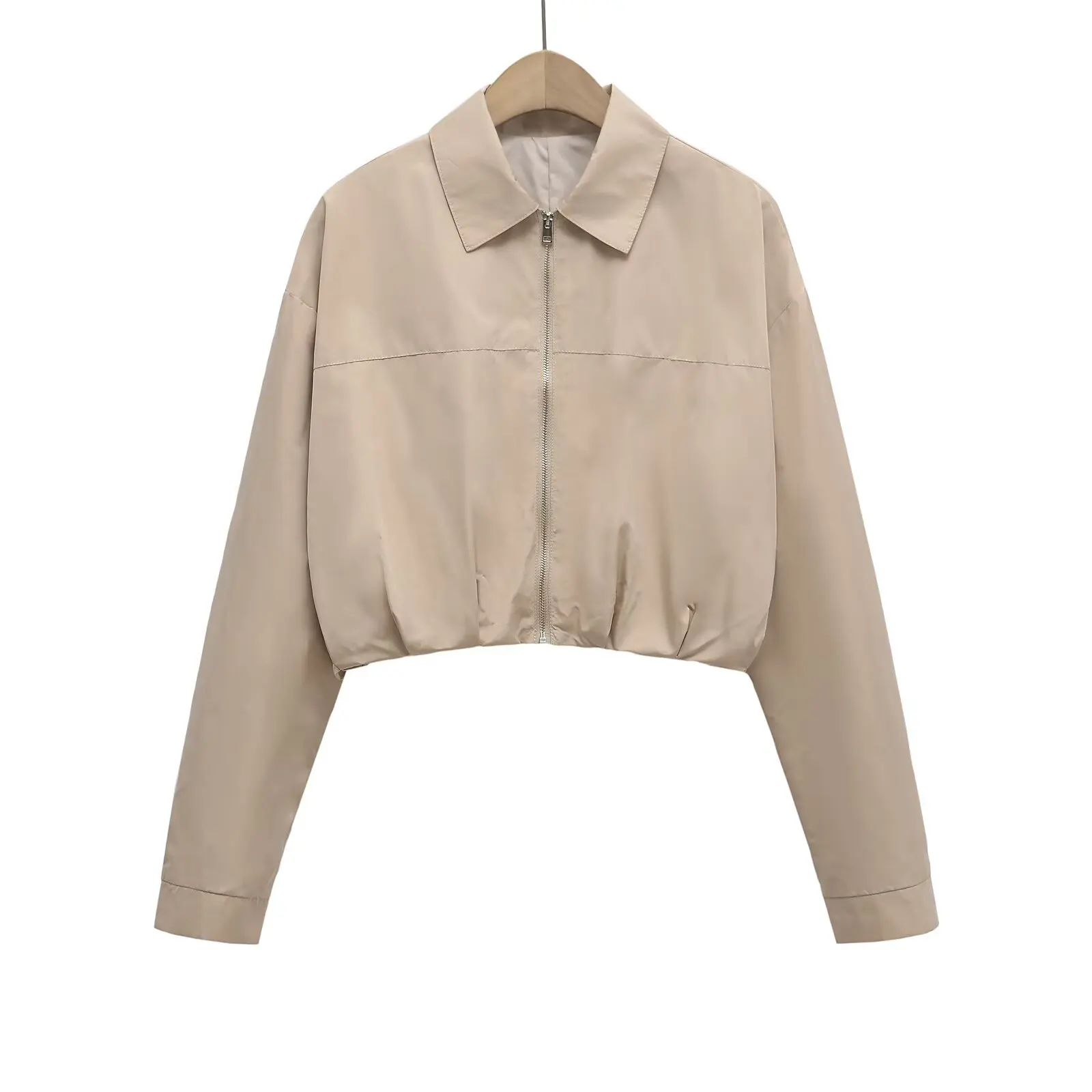   Sommer neue einfache und modische Reißverschluss freiliegende Taille plissierte Dekoration breites Revers langärmelige kurze Jacke