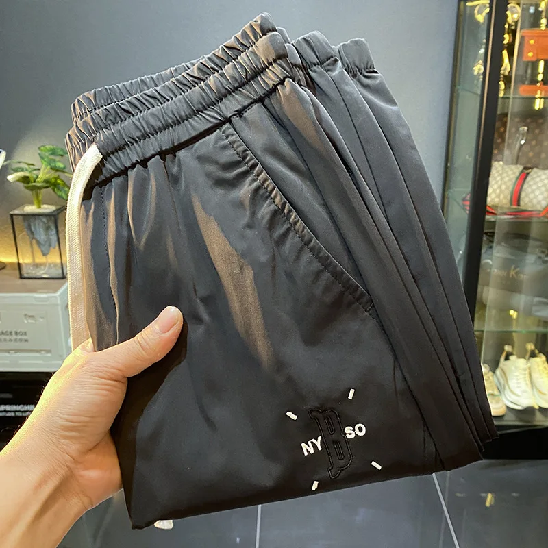 

Ice Silk Casual Pants Men's Summer2024New Ultra-Thin Ankle-Tied Sports Pants Fashion Brand Quick-Drying Cool Long Pants