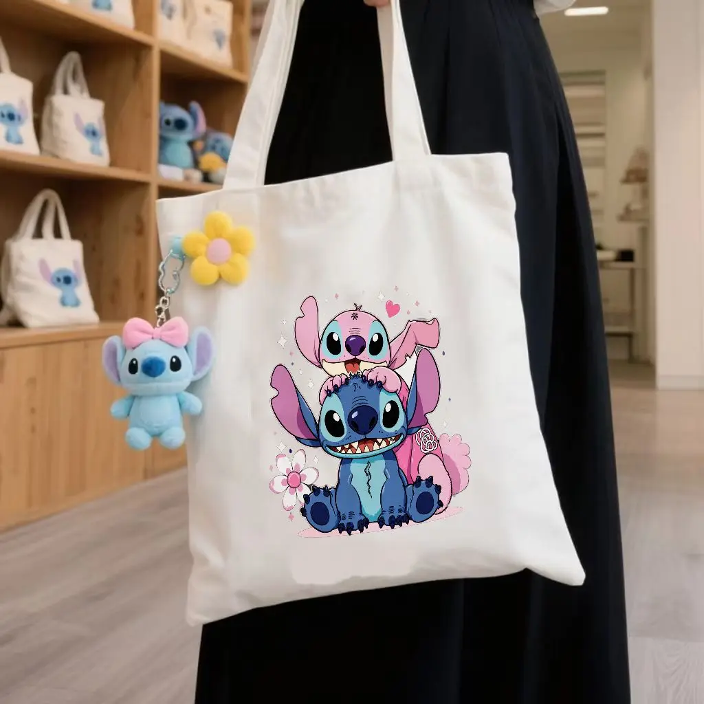 Bolso de mano de lona Lilo & Stitch: bonito diseño de punto y ángel de dibujos animados, opciones de color natural beige y negro, flores juguetonas brillantes