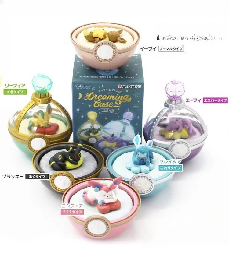 

Pokémon Eevee and Friends Surprise Box: 2 Pokebols with Collectable Figures of Eevee, Mirror, Umbreon and Sleeping Glaceon