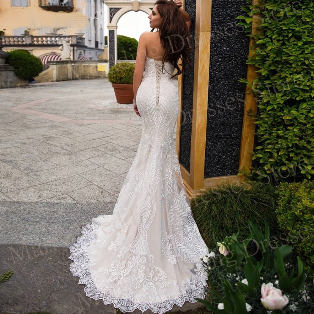 Sexy Slim-Line sirena bellissimi abiti da sposa Lace Up Appliques senza spalline abiti da sposa Backless senza maniche Vestidos De Novia