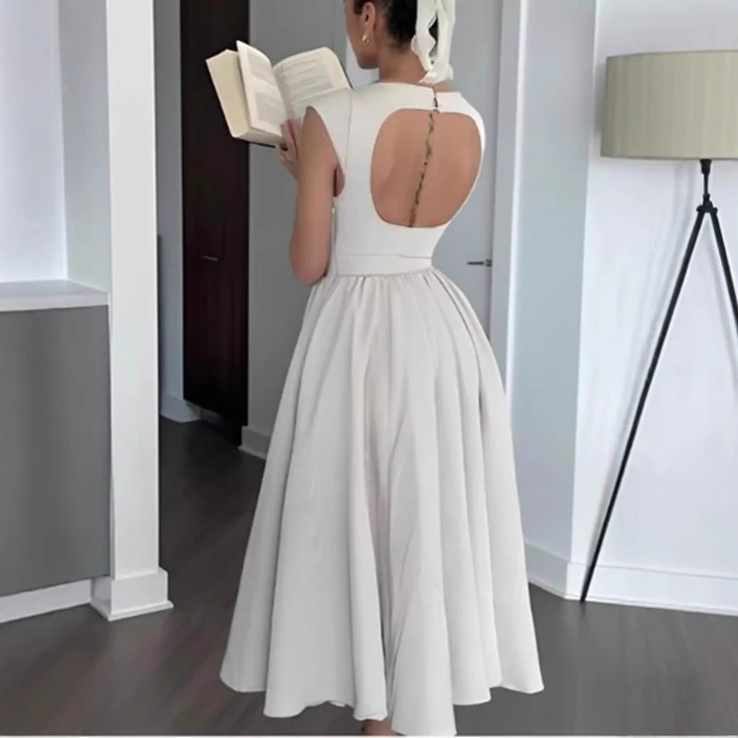 2025 Primavera estilo francês puramente sensual vestido evasê definido na cintura sem mangas com design recortado nas costas