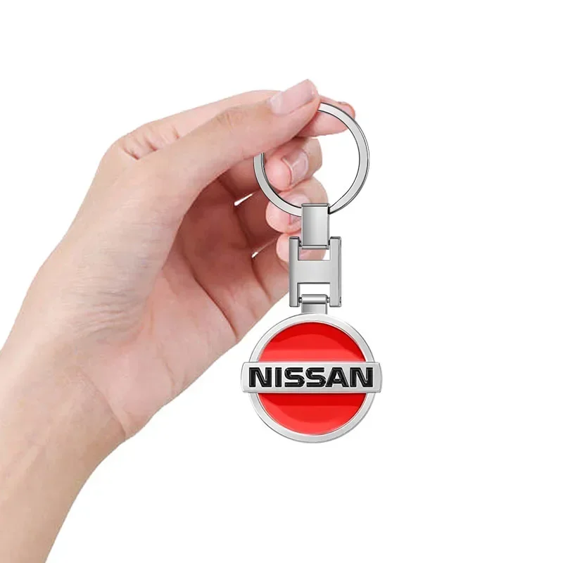 พวงกุญแจโลหะ 3 มิติ รูปโลโก้รถยนต์ อุปกรณ์ตกแต่งภายในรถยนต์ สำหรับ Nissan Nismo 370Z GTR Almera Tiida Juke Teana Qashqai 350Z