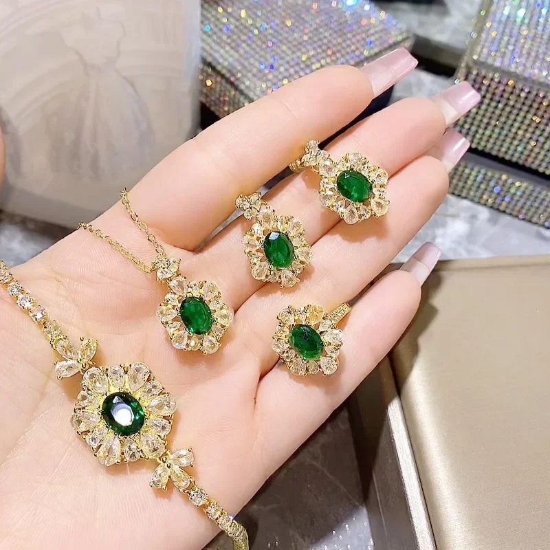 

MDL Moissanite Style Jewelry Fashion Set Gold-plated Imitation Emerald Treasure Pendant 10 * 12 Earrings Loose Ring Four Sets