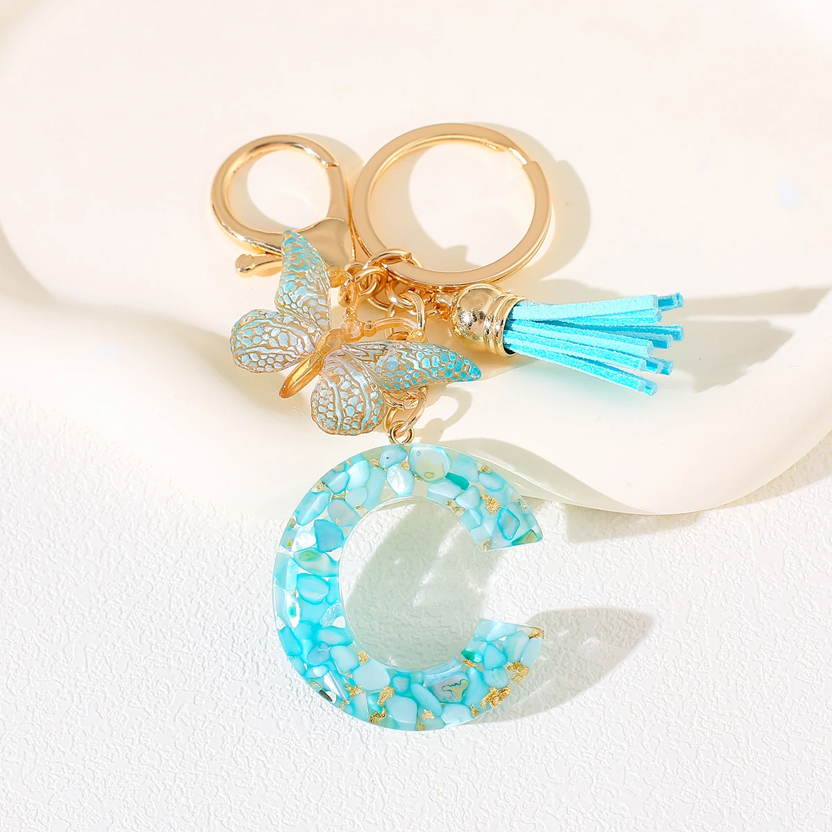 السماء الزرقاء الأبجدية رسالة المفاتيح مع فراشة هامش الراتنج حجر الأولي كيرينغ للنساء الإناث فتاة حقيبة الظهر قلادة M S