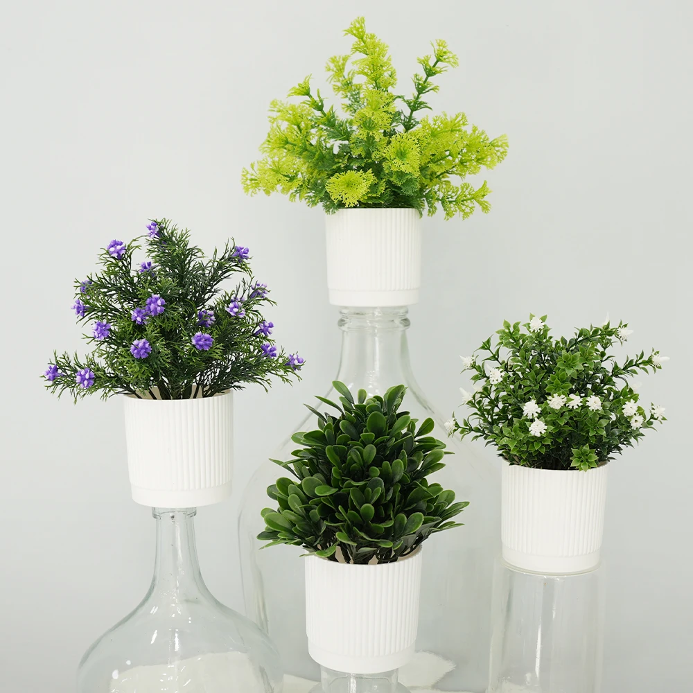 Lot de 4 petites plantes artificielles miniatures avec fleurs, décorations de printemps pour la maison, la chambre, la ferme, le bureau