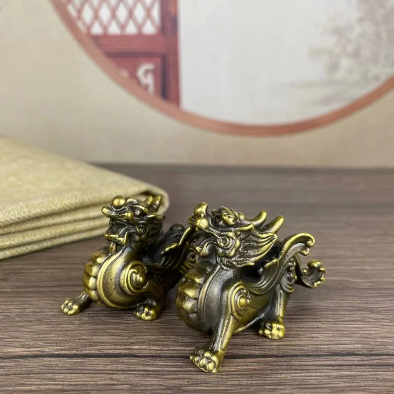 A pair of brass Pixiu ornaments, male and female, made entirely of copper, suitable for home, office, study, wine cabinet, or as