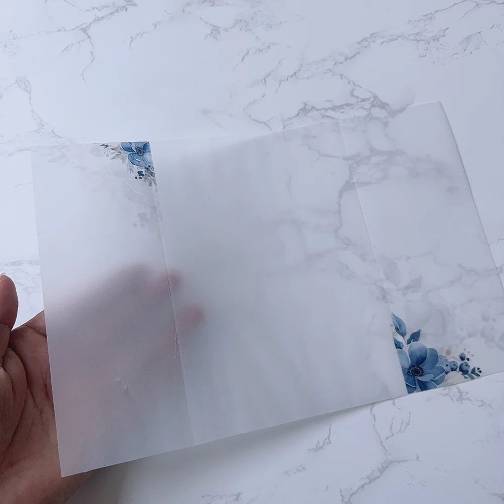 Blue flower with leaf Vellum Wrap suitable for a 5 x 7 Wedding Invitation