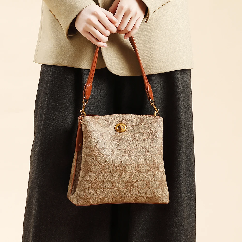 Women's brand leather bucket bag, new model 2026. This stylish single-shoulder handbag features high-end designer style and can