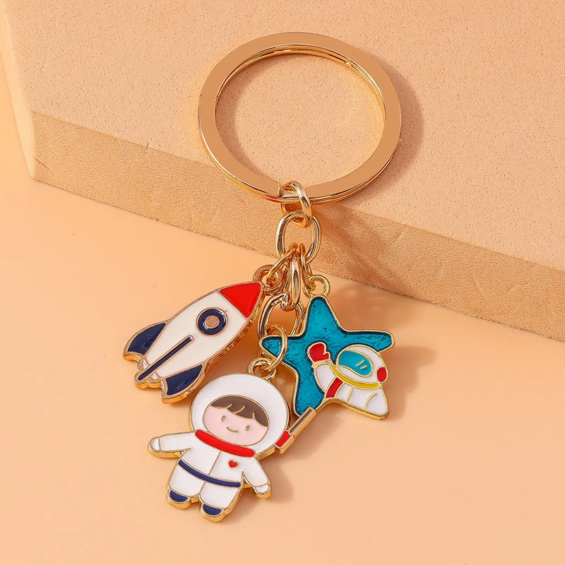 Cute Enamel Cartoon Astronaut Keychain Rocket Key Ring Pendant for Key Holder Women Girls Handbag Pendants DIY Jewelry Gift