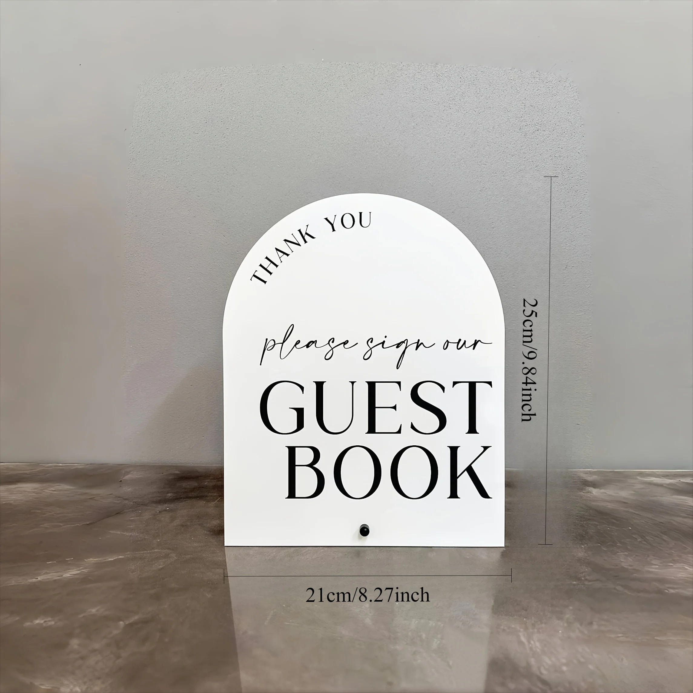 Elegant white arched guestbook sign with black stand - Polymer wedding and event table decor.