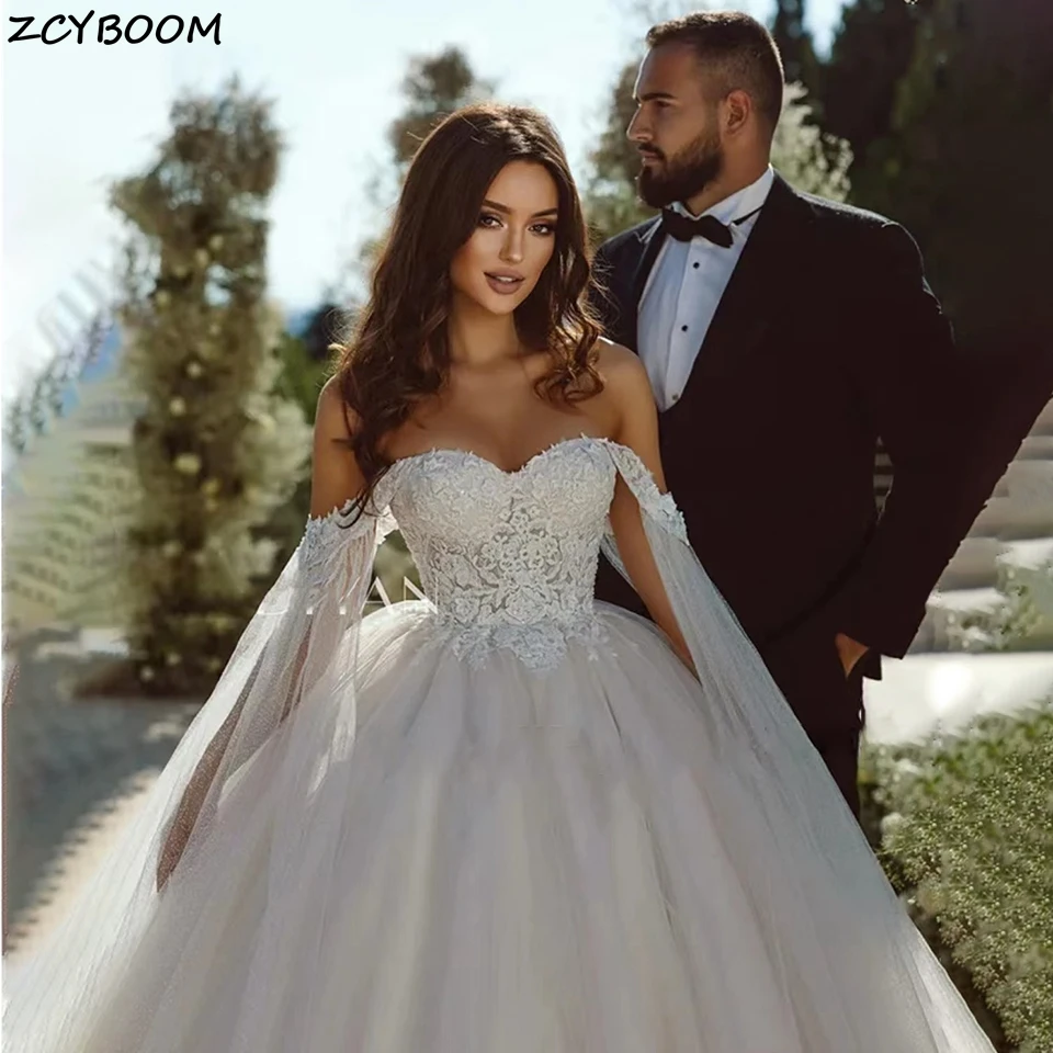 Appliques di pizzo principessa di lusso al largo della spalla una linea abiti da sposa 2023 corte treno Tulle abiti da sposa Plus Size per le donne