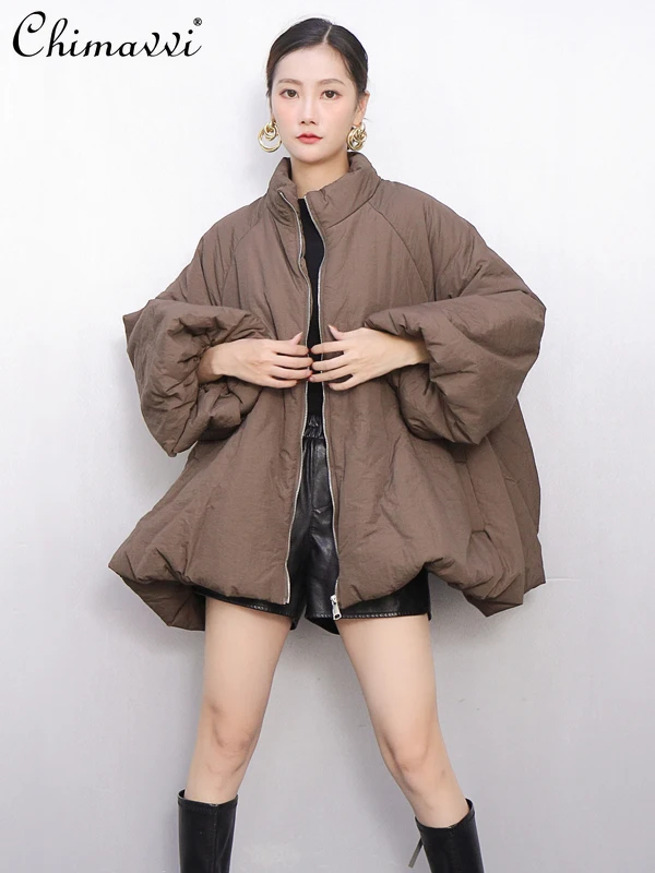 

2025 зимняя новая женская мода, свободная стеганая куртка трапециевидной формы с воротником-стойкой, модные повседневные женские топы с длинными рукавами в стиле ретро