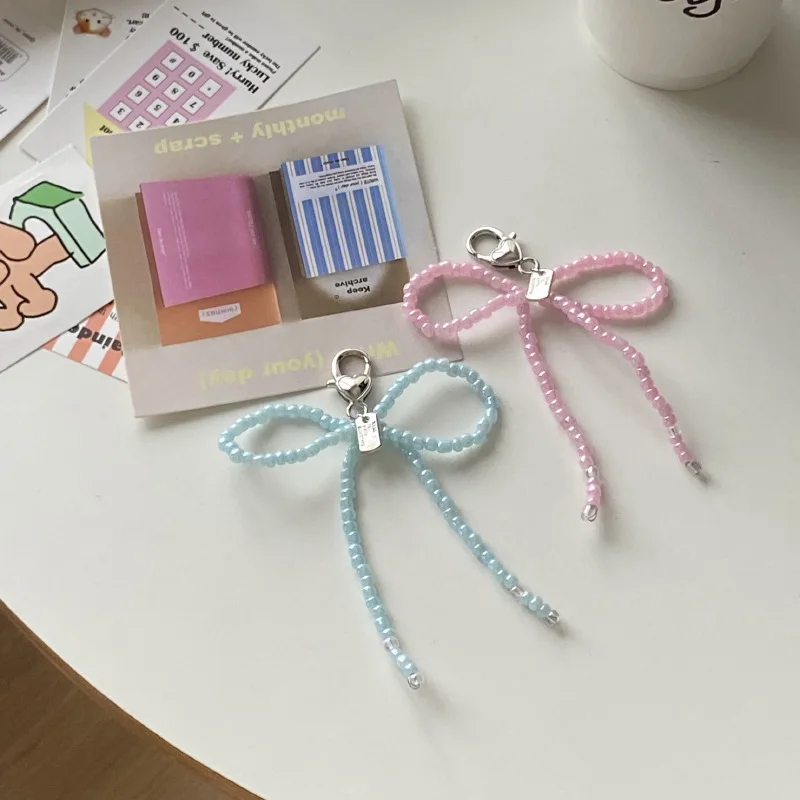 Shining U ちょう結びビーズ電話チェーン 女性用バッグチャームファッションアクセサリーギフト 2個