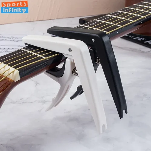 Imagen 1 del producto Clip Universal para capó de guitarra acústica, abrazadera de Metal de plástico con herramientas de cuerdas cambiantes para guitarra eléctrica clásica de madera y ukelele