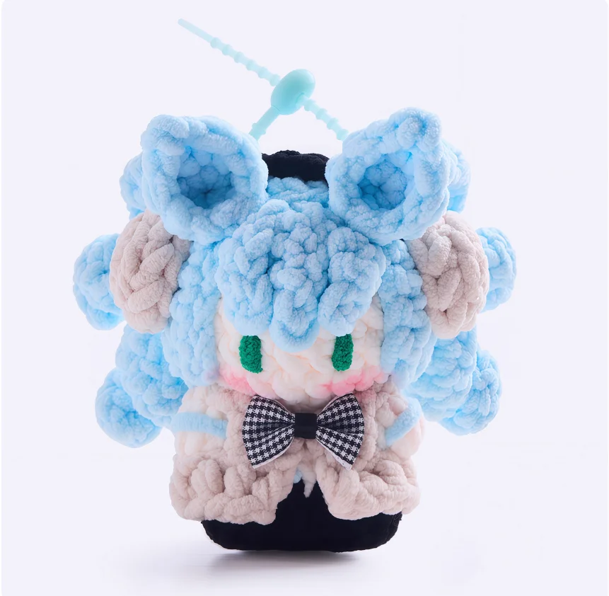 Future-themed anime merchandise: handmade crocheted plush doll keychains/bag charms featuring Miku.