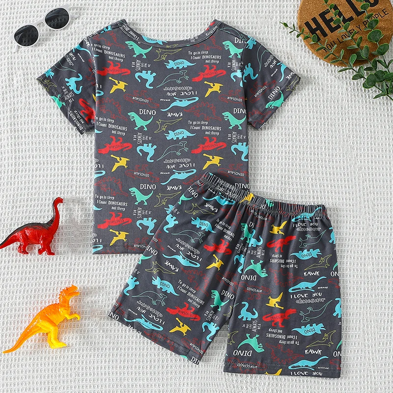 Conjunto de 2 peças com estampa de dinossauro para crianças, camiseta fofa de manga curta para meninos e meninas, cintura elástica, shorts confortáveis