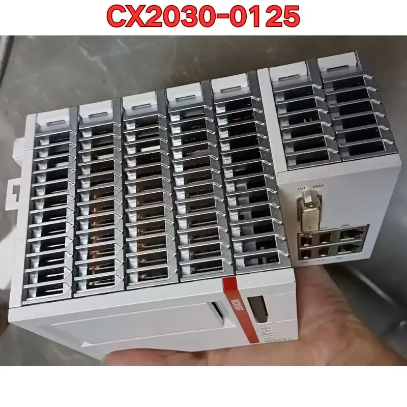 El módulo de control PLC de segunda mano CX2030-0125 es un prueba de función normal