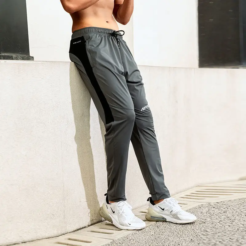 

Mens Sweatpant Pants Breathable High Elastic Quick-Drying Sports Fitness Pants Male Ankle-Tied Loose Running Training Trousers