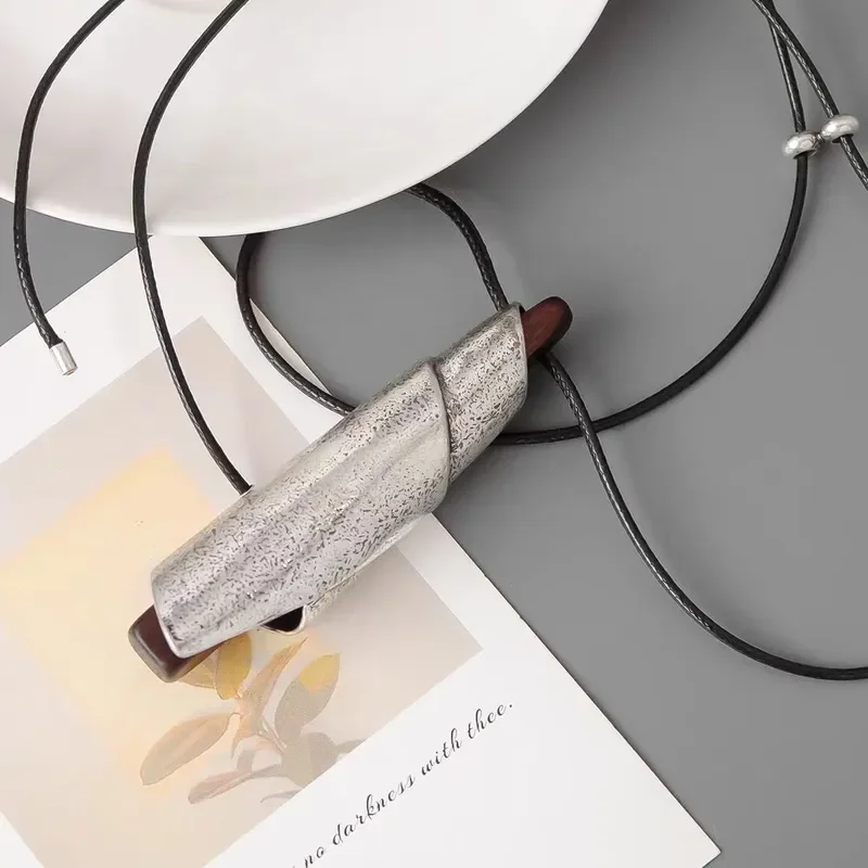 European and American retro whistle necklace light luxury high sense Korean wax rope sweater chain ebony silver roll pendant