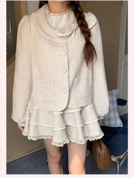 Otoño Invierno nuevas mujeres agradable arco blanco roto lindo cuello Peter Pan Chaqueta corta moda reductor de edad versátil Top de manga larga