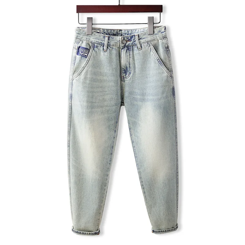 Celana denim pria musim gugur terbaru, warna terang, efek cuci, model sedikit meruncing, longgar, trendi, serbaguna, dan ramping.