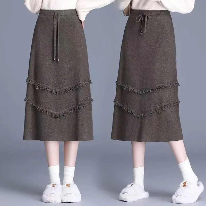 

Осень-зима, темпераментная шнуровка, высокая талия, юбка трапециевидной формы, женские офисные женские простые юбки с кисточками и эластичной резинкой на талии