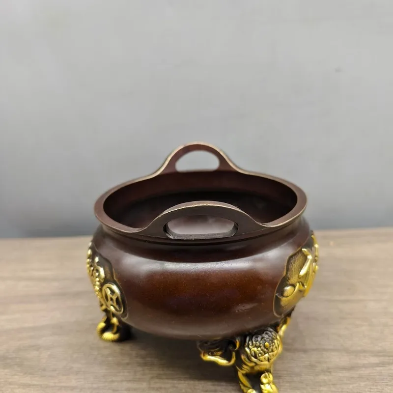Pure gilded elephant- , antique-style purple copper three-legged Xuan De incense burner, a decorative