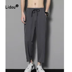Korean Casual Man Solid Color Elastic Force Trousers New Classic Loose Pocket Straight Cylinder Fashion Male Ninth Pants Thin