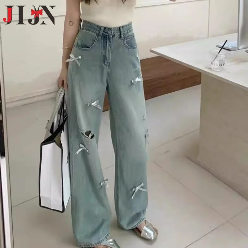 Fashionable Women's Elastic Distressed Jeans Minimalist Slim Fit Pencil Pants Torn Hem Small Leg Pants for Women