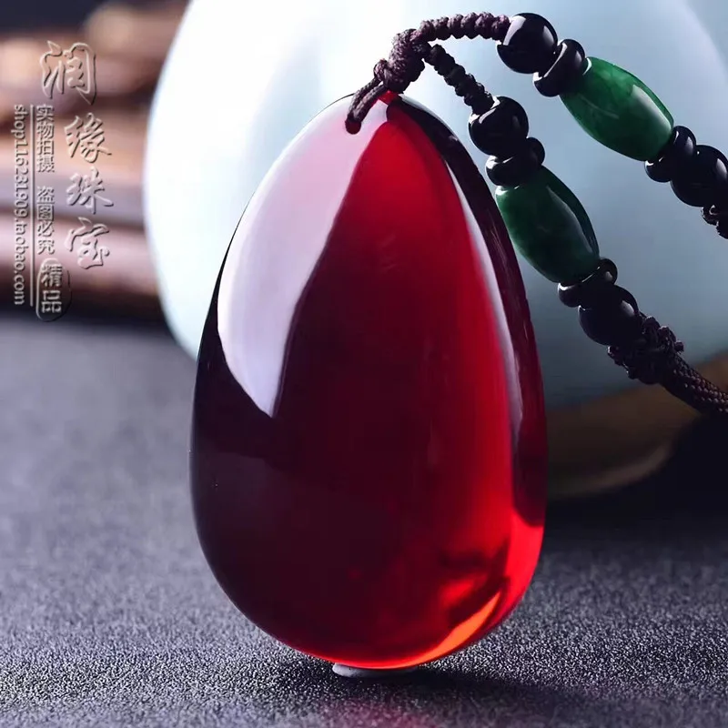 Bezpośrednia sprzedaż w fabryce bałtyku z bursztynu z wosku pszczelego bezpieczna marka kropla krwi bursztynu zawieszka męskiego i damskiego swetra