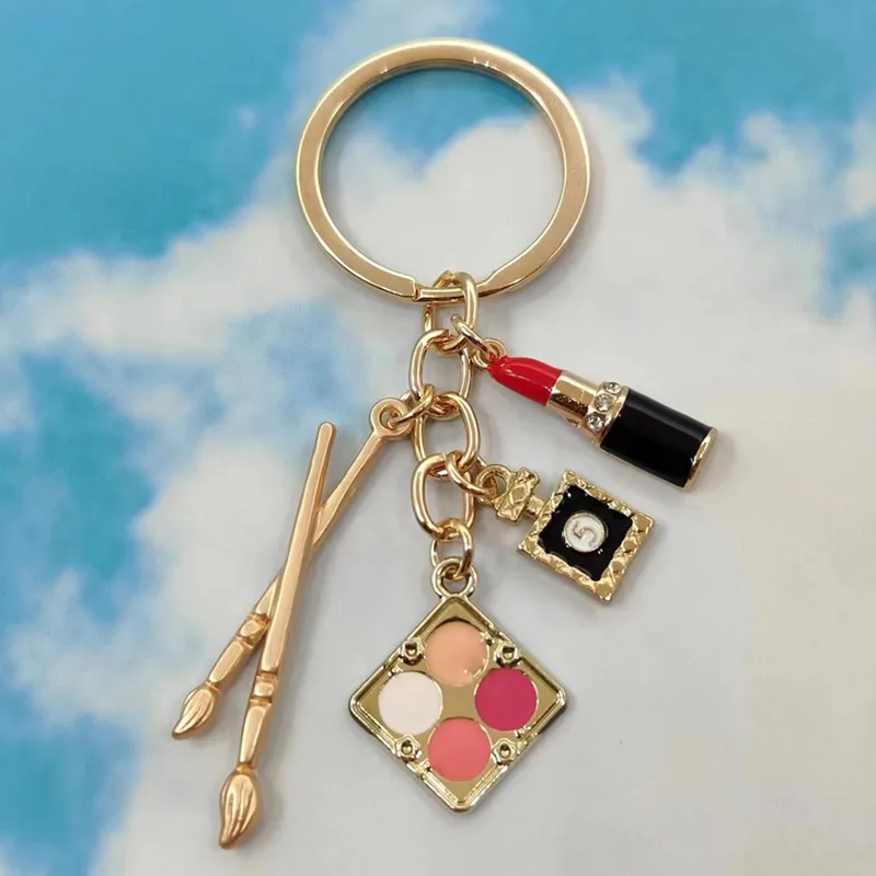 Fashion Beauty Cosmetics Key Chain Lipstick Makeup Pen perfume Bottle Enamel Mixed Powder Makeup Key Chain Beauty Jewelry