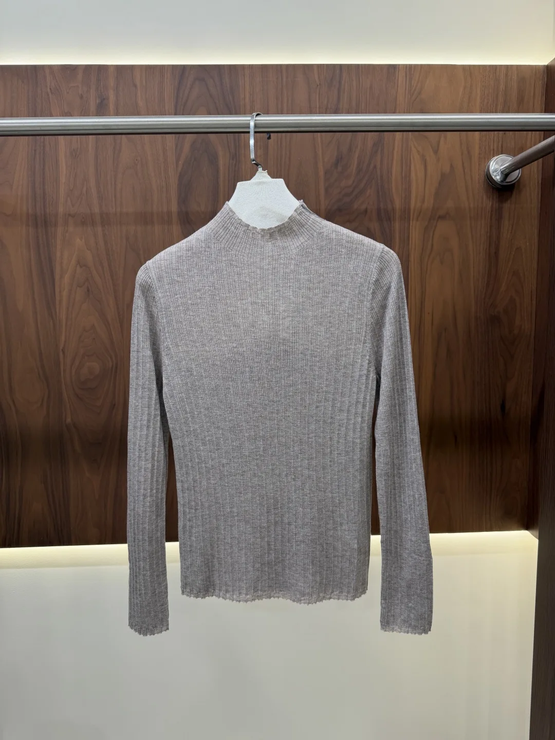 Pale pinkish gray