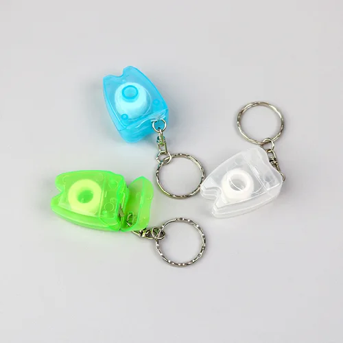 Imagen 2 del producto 50 Uds. Llavero de hilo Dental, rollo de hilo Dental portátil, llavero en forma de diente, herramienta de limpieza bucal para el cuidado de los dientes