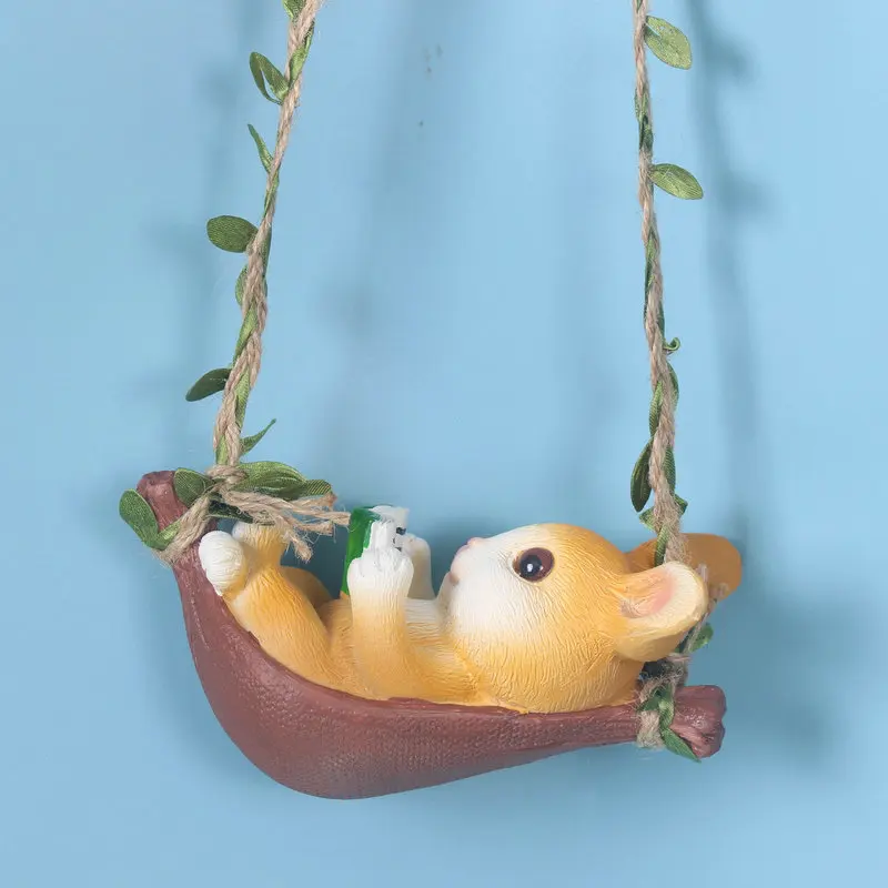 Cute little rabbit reading, swinging on a swing, garden landscape, courtyard, balcony, window sill decoration, pendant, hanging