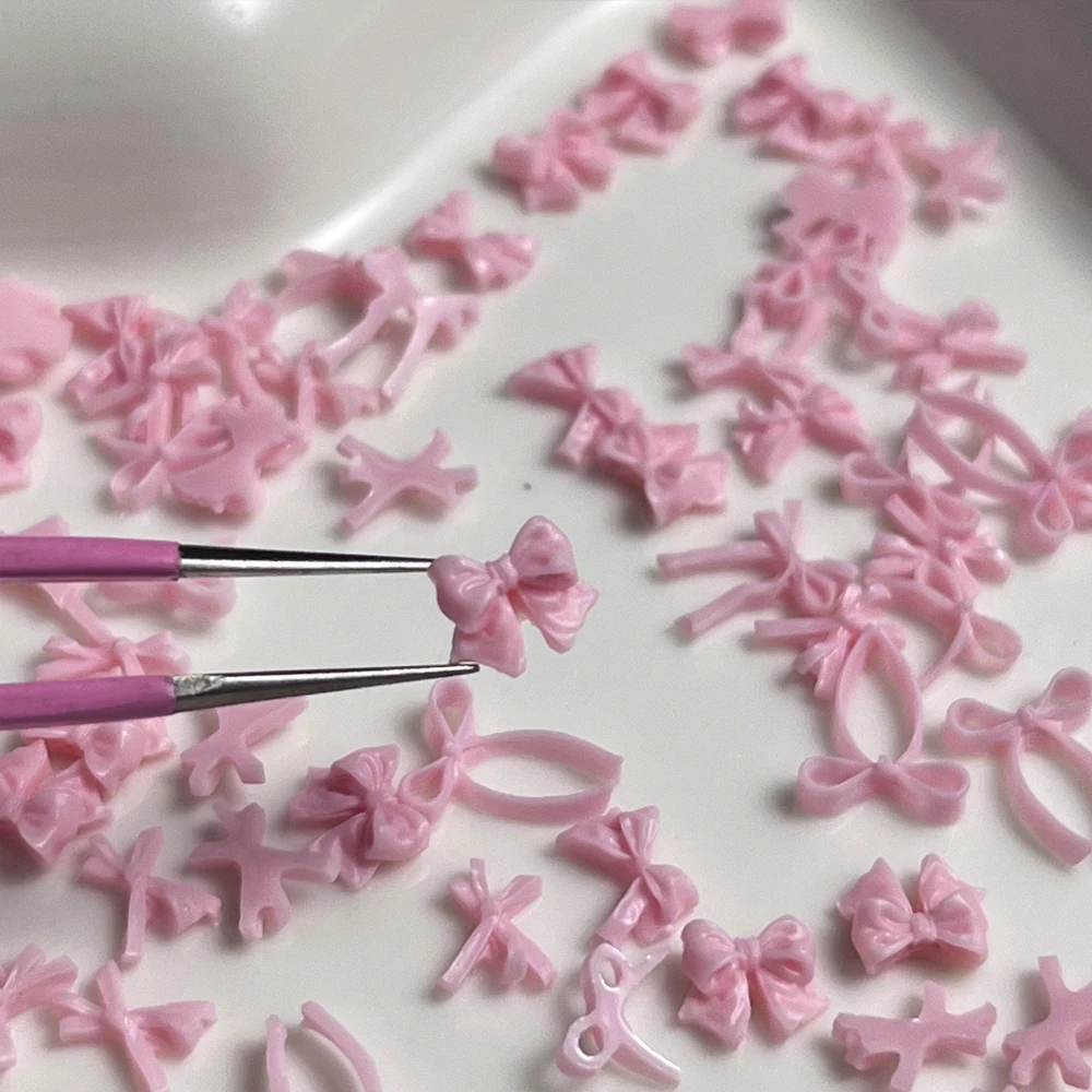 ﻿ 100 قطعة القوس الشريط الوردي مسمار الديكور ثلاثية الأبعاد الراتنج Kawaii الدانتيل Bowknot التعادل مسمار الملحقات الأبيض/الأزرق الحلو مانيكير السحر أجزاء