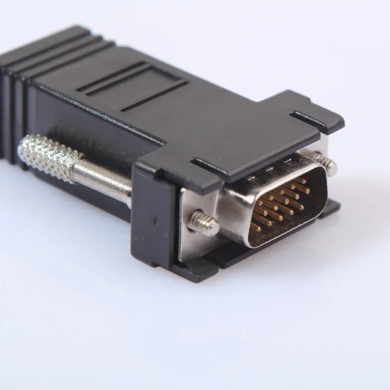 De VGA-to-RJ45 Adapter Extender Zendt Vga Signalen Met De Netwerkkabel, en De Vga-Te-Netwerk Kabel Extender Heeft 15 Pins