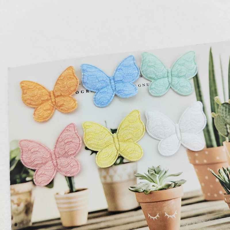 100 sztuk/partia 3.1*2.5CM motyl wyściełane aplikacje dla Craft ubrania akcesoria do szycia DIY akcesoria do włosów klip poprawki