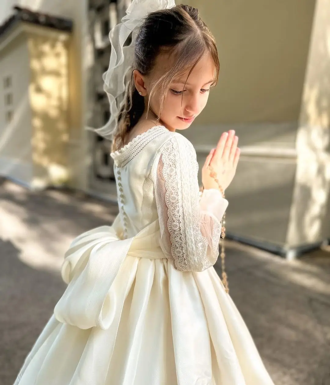 FATAPAESE Customized First Communion Dress Made with Satin Fabric Long Sleeves with Laces Bow and Covered Buttons for Closure