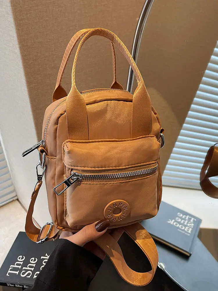 bolsa-de-ombro-casual-de-lona-fena-2026-nova-bolsa-transversal-leve-com-design-simples-e-multiplos-bolsos-para-celular