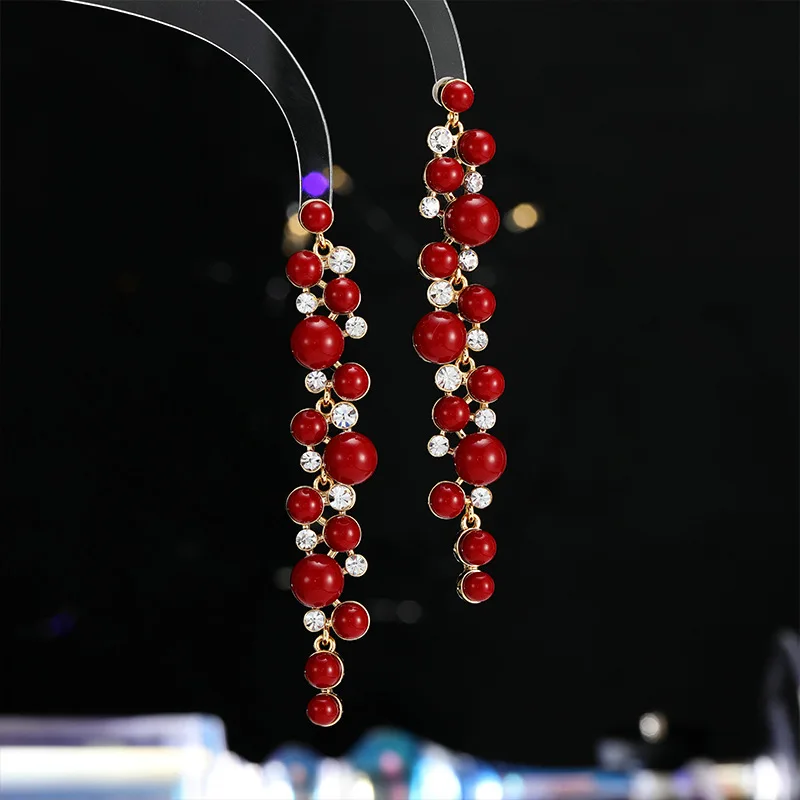 

Retro red New Year earrings, long and elegant, slimming face, stud earrings, simple and versatile pearl earrings
