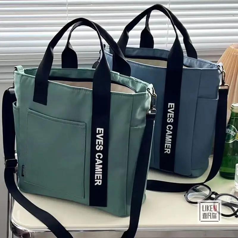New waterproof and stylish tote canvas hand-held crossbody bag, versatile single shoulder hand-held bento lunch box bag