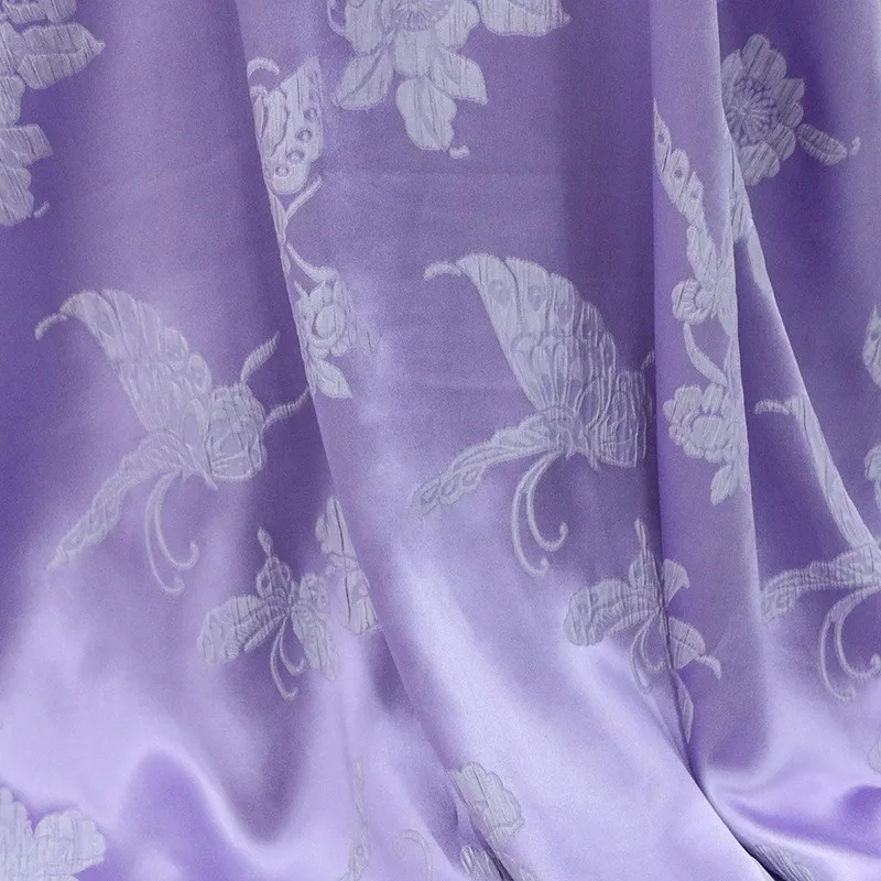 

Silk embossed Crope crepe jacquard satin fabric with a wide lustrous finish fashion design