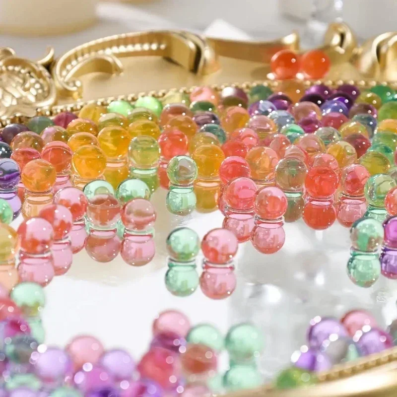 100000PCS 7-8 Millimetri Sfera Dell'acqua Perline Ricarica Munizioni Gel Splater Palla Blaster Proiettili Per Gel Per 416 AK P90 Pistola Giocattolo Ammos