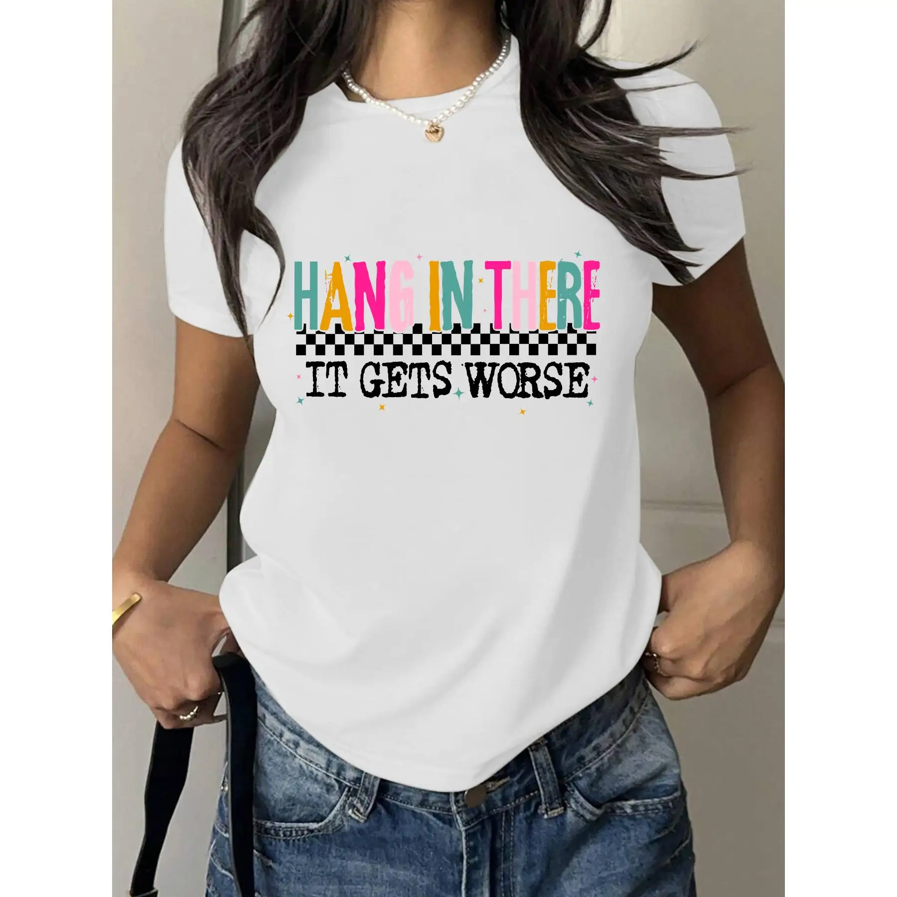

T - Shirt With “HANG IN THERE IT GETS WORSE” Slogan And Checkered Design, For Dark Humor Lovers.