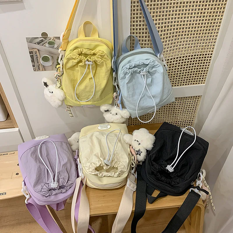 

Women's waterproof nylon light commuting phone bag pull rope strap mouth square hand bag shoulder sling water cup bag