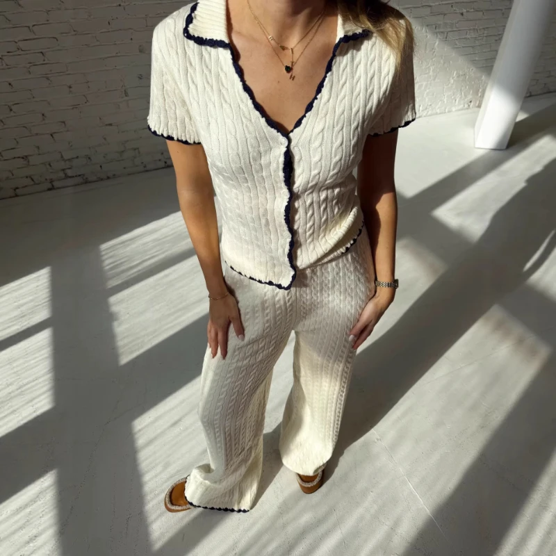 2026 Spring/Summer Pure White Knitted Short sleeved Pants Two piece Set with Elegant Design Sense Black Contrast Edge Set