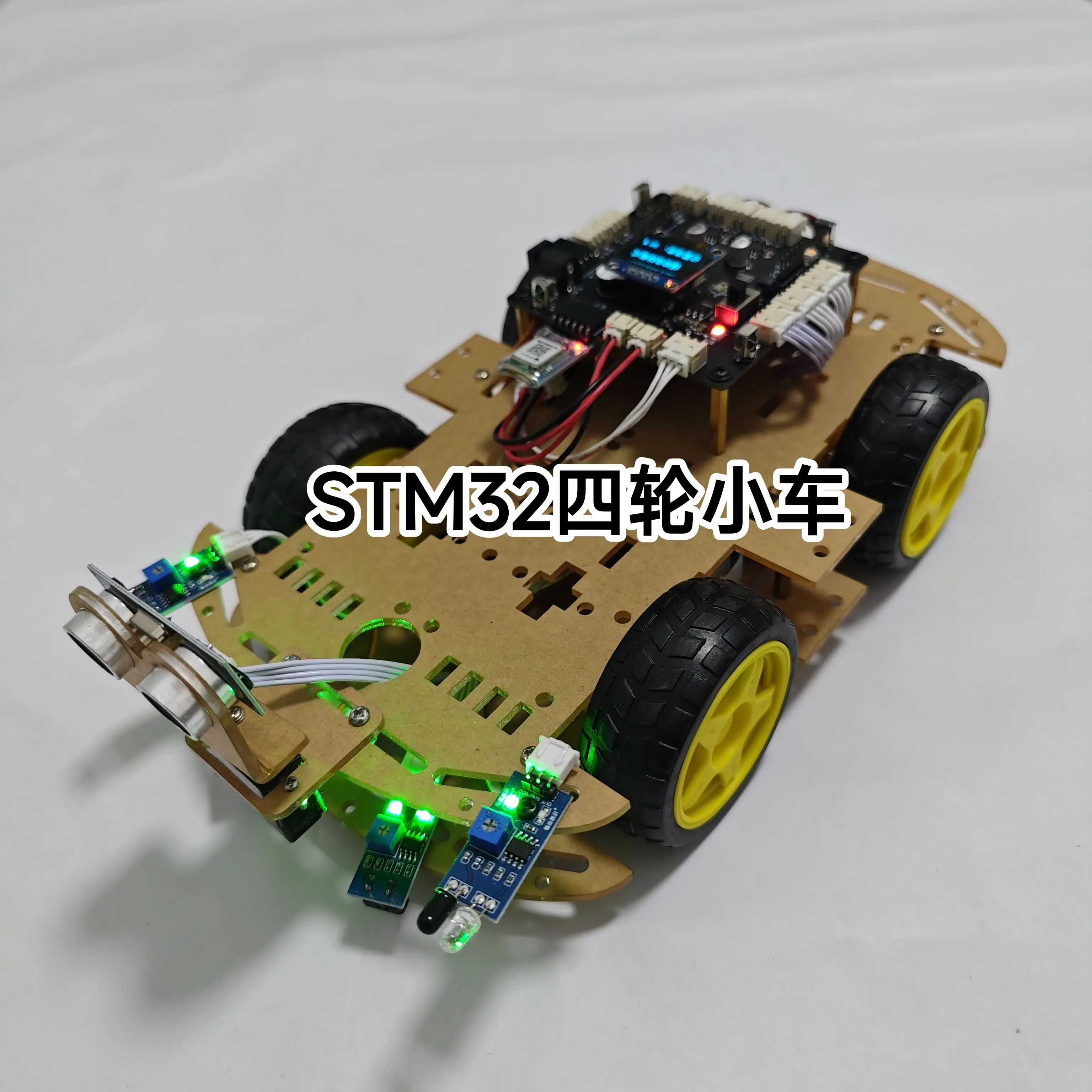 STM32 Intelligent Four-wheel Car, Obstacle Avoidance Tracking Speed Measurement Display Screen Infrared Remote Control Bluetooth