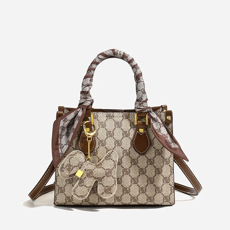 

Стильная сумка для подгузников для женщин, кожаная сумка через плечо, роскошная винтажная сумка-тоут, минималистичная дизайнерская сумка с большой вместимостью, элегантная.